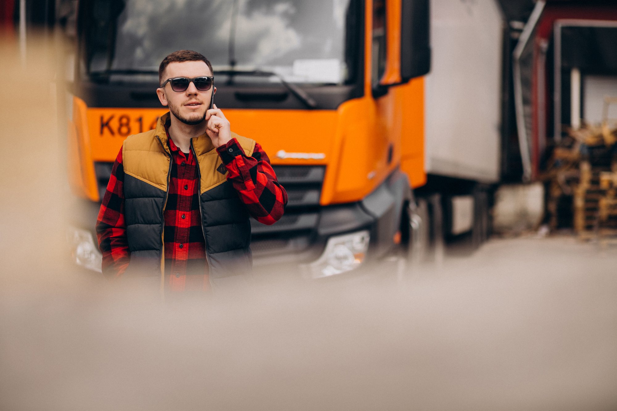 handsome-man-truck-driver-standing-by-truck handsome-man-truck-driver-standing-by-truck